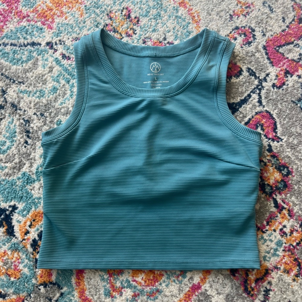 move theology workout tank top